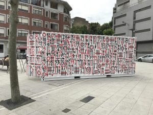 White Arteko Container decorated with red and black numbers in a square